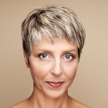 A woman with a pompadour pixie hairstyle.