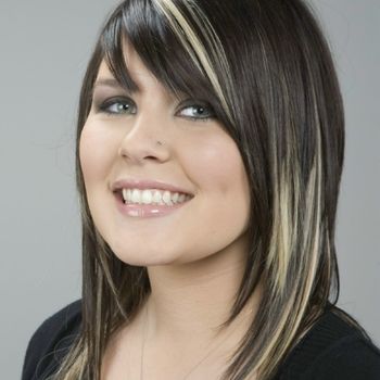 A woman with a layered long bob.